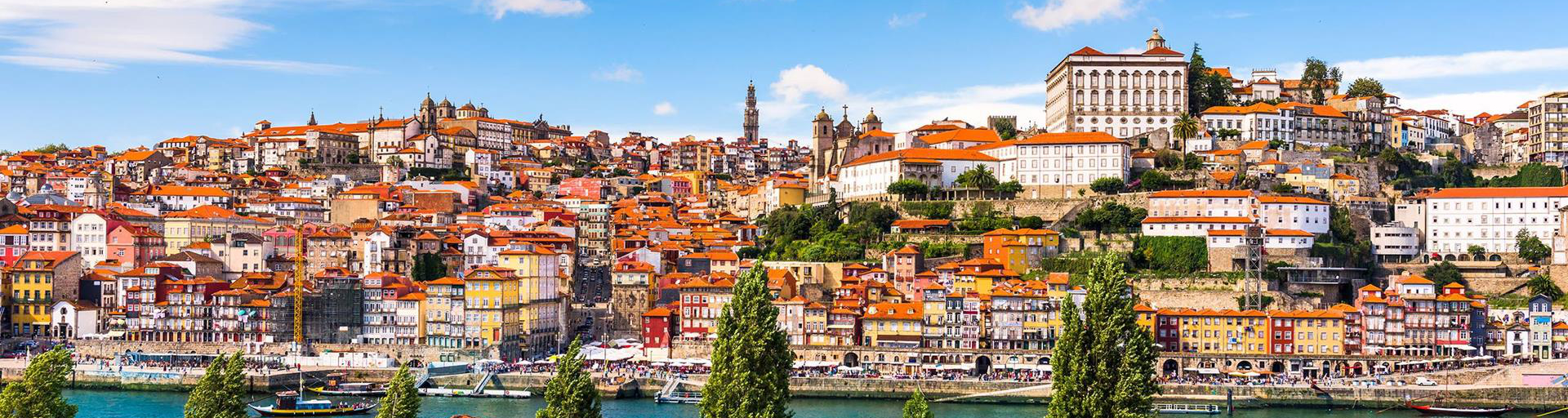 Colorful riverside buildings rising above the Douro in Porto